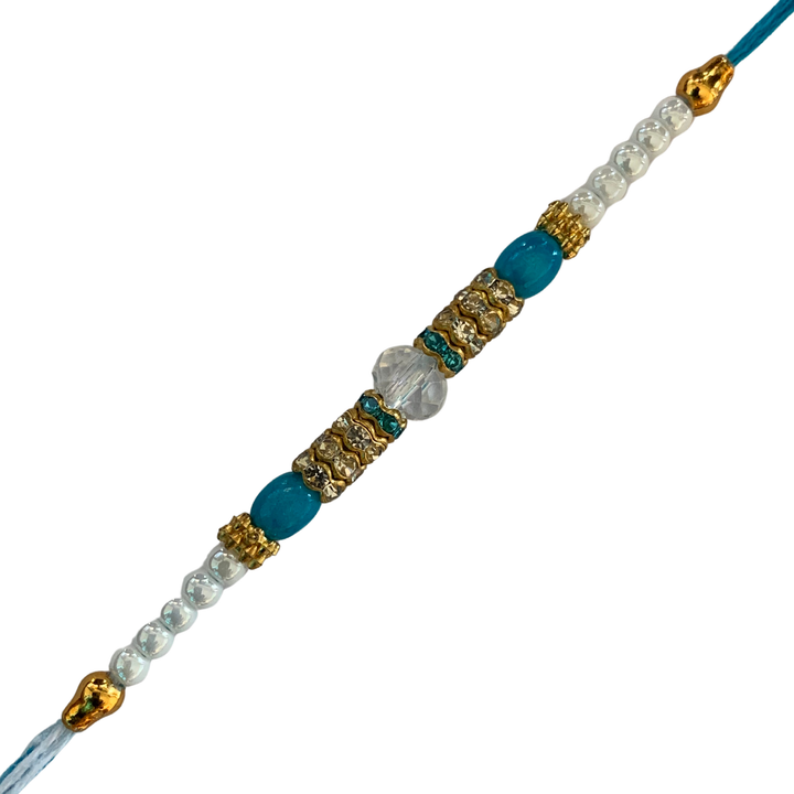 Royal Light Blue Crystal Rakhi with Golden Accents