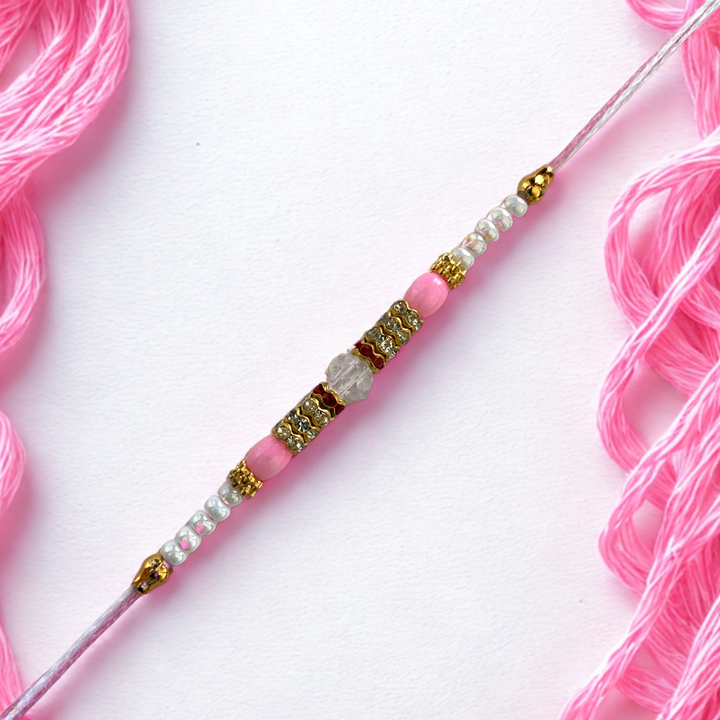 Royal Light Pink Crystal Rakhi with Golden Accents