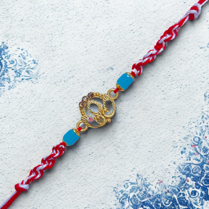 Elegant Peacock Rakhi with Blue Beads & Red Thread