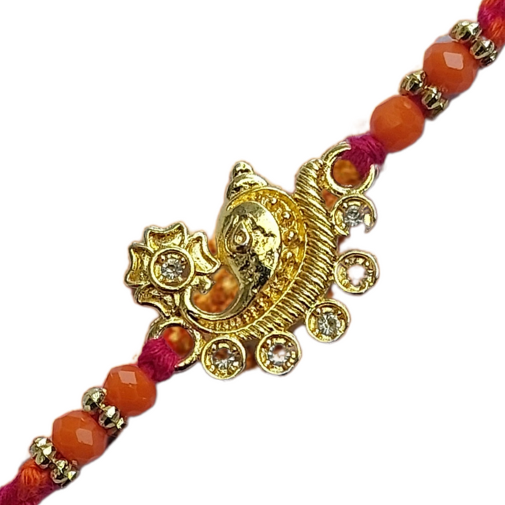 Antique Gold Paisley Rakhi with Crystal Embellishments