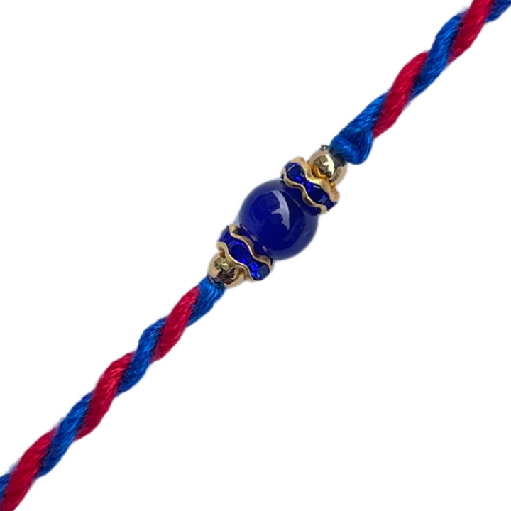 Minimal Blue Bead Rakhi on Dual-Tone Thread