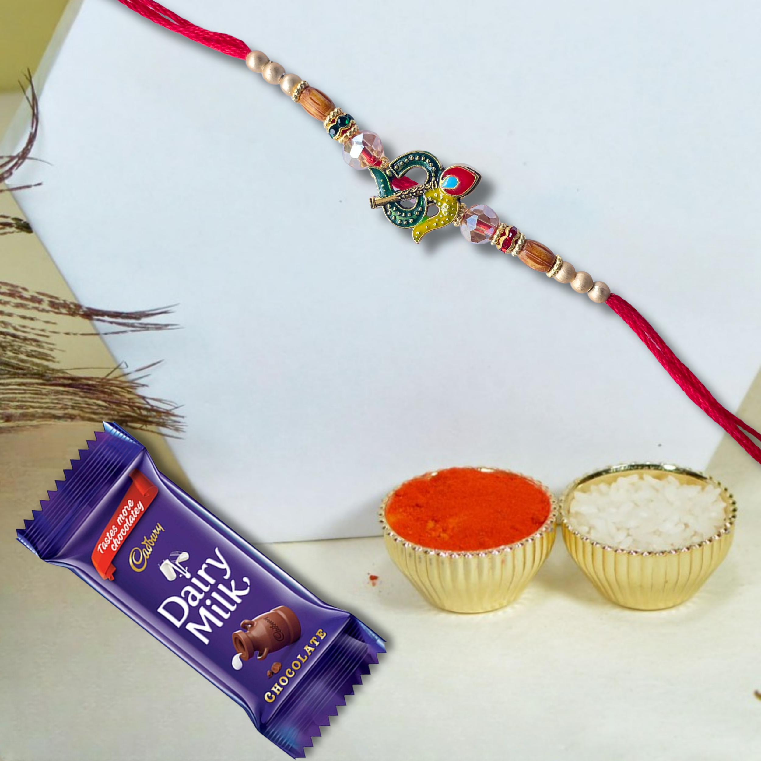 Om Vachan Rakhi - Traditional Rakhi with Cadbury Dairy Milk Chocolate Bar , 21 g
