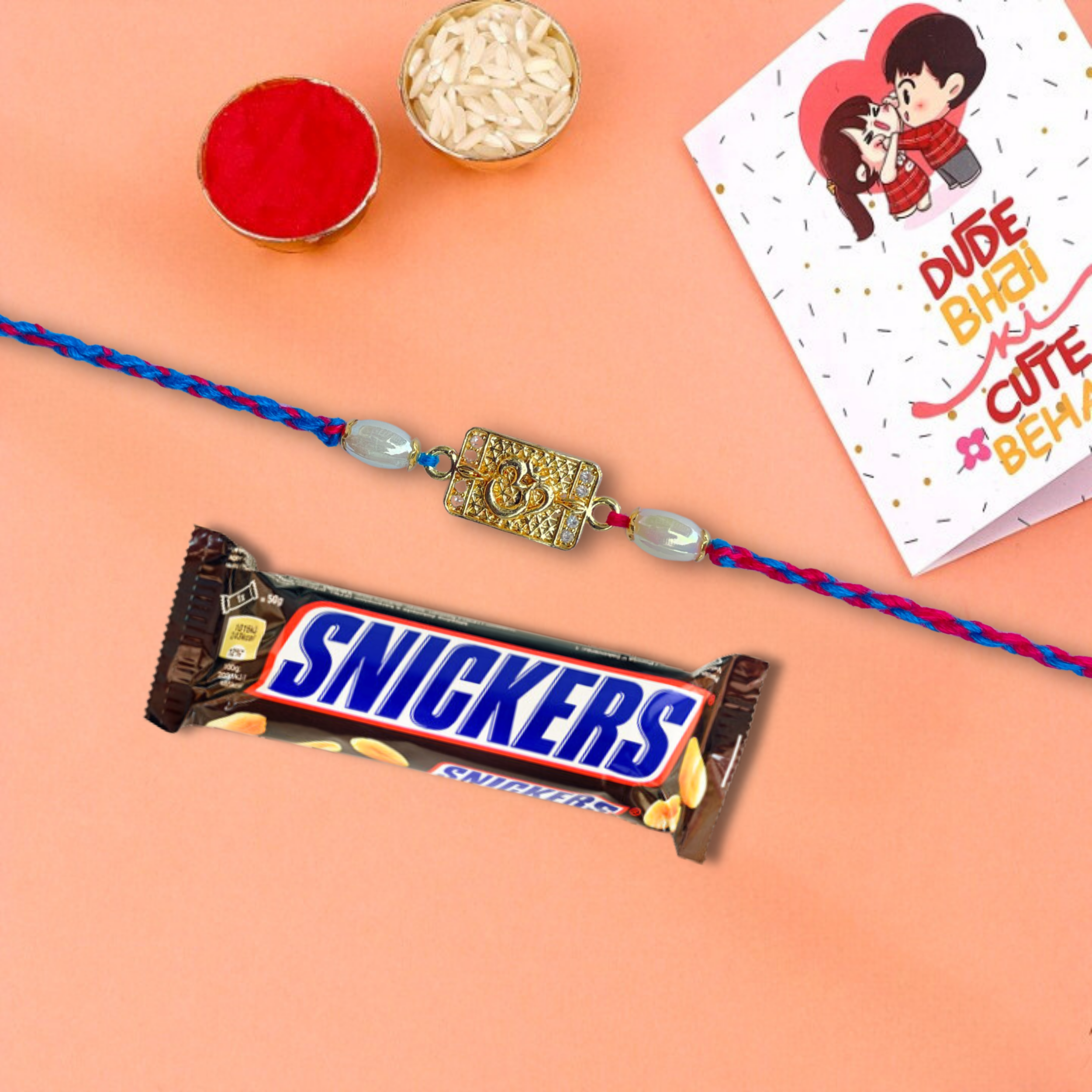 Spiritual Om Rakhi With Snickers Peanut Filled Chocolate Bar, 20 g