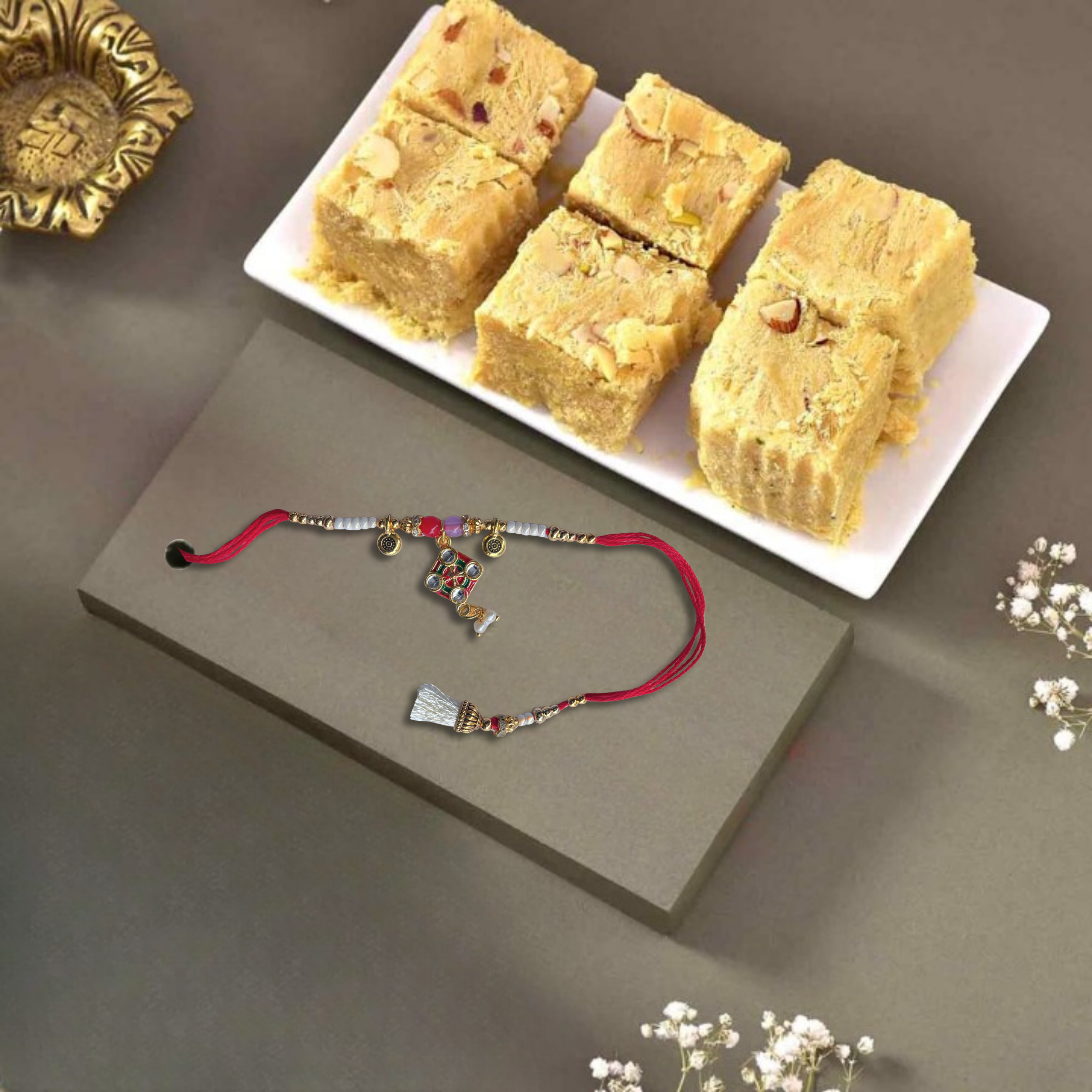 Divine Kalasham Sacred Charm Rakhi with Haldiram's Soan Papdi, 250 g Pouch