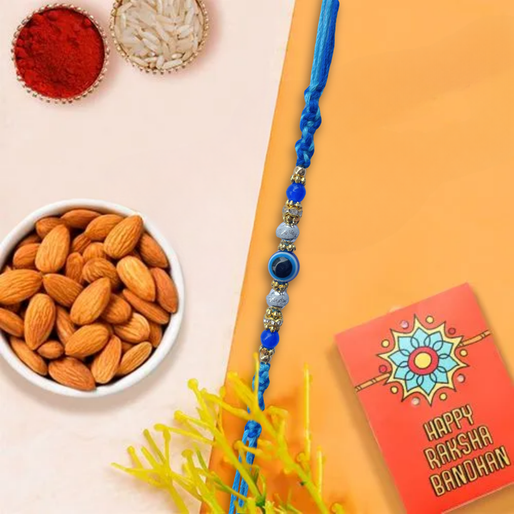 Blue Evil Eye Rakhi with Premia Badam (Almonds): 200 g