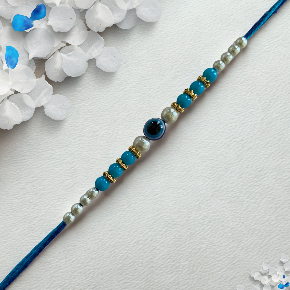 Blue Beaded Pearl Rakhi with Evil Eye Charm