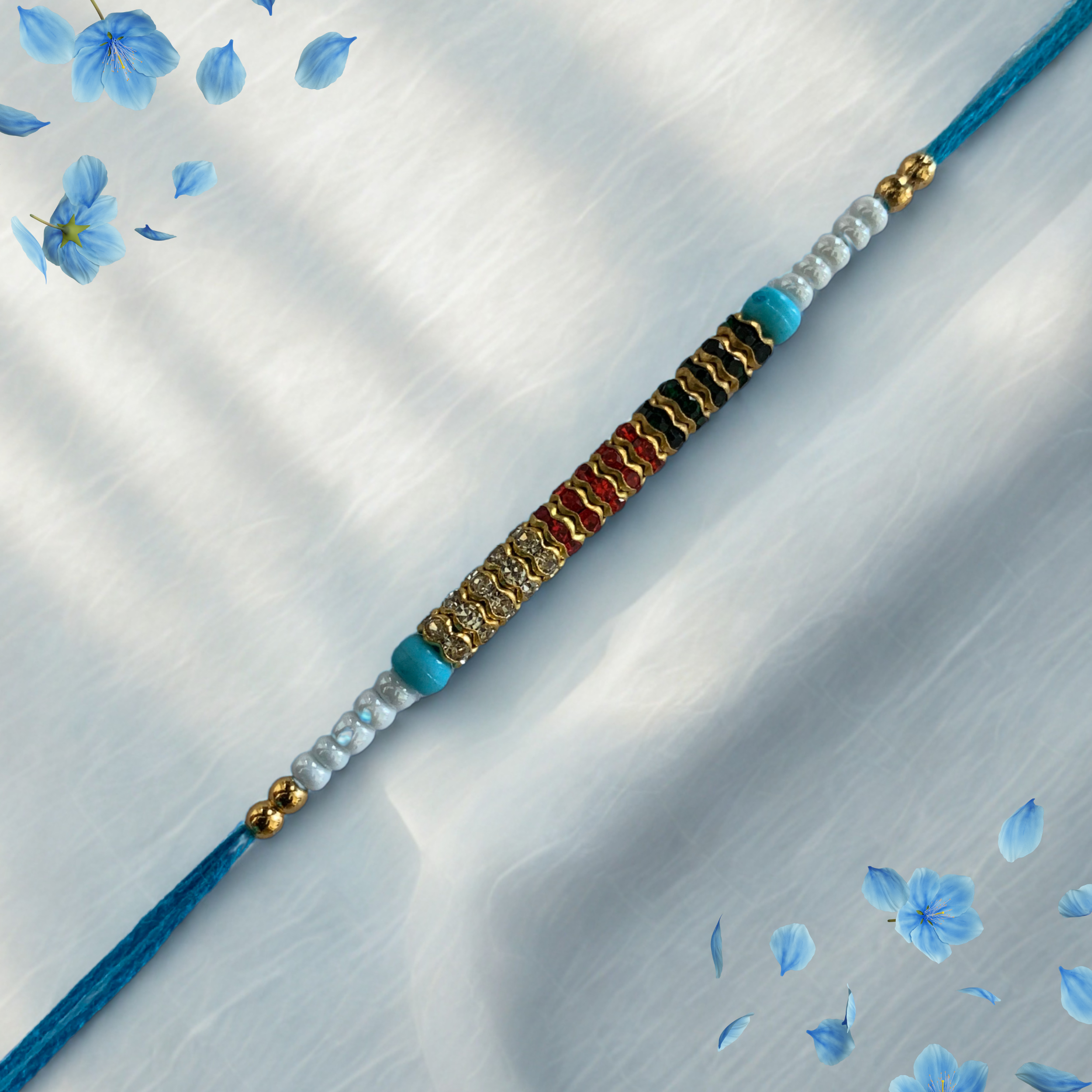 Multicolor Threaded Rakhi with Golden Rings and Blue Thread