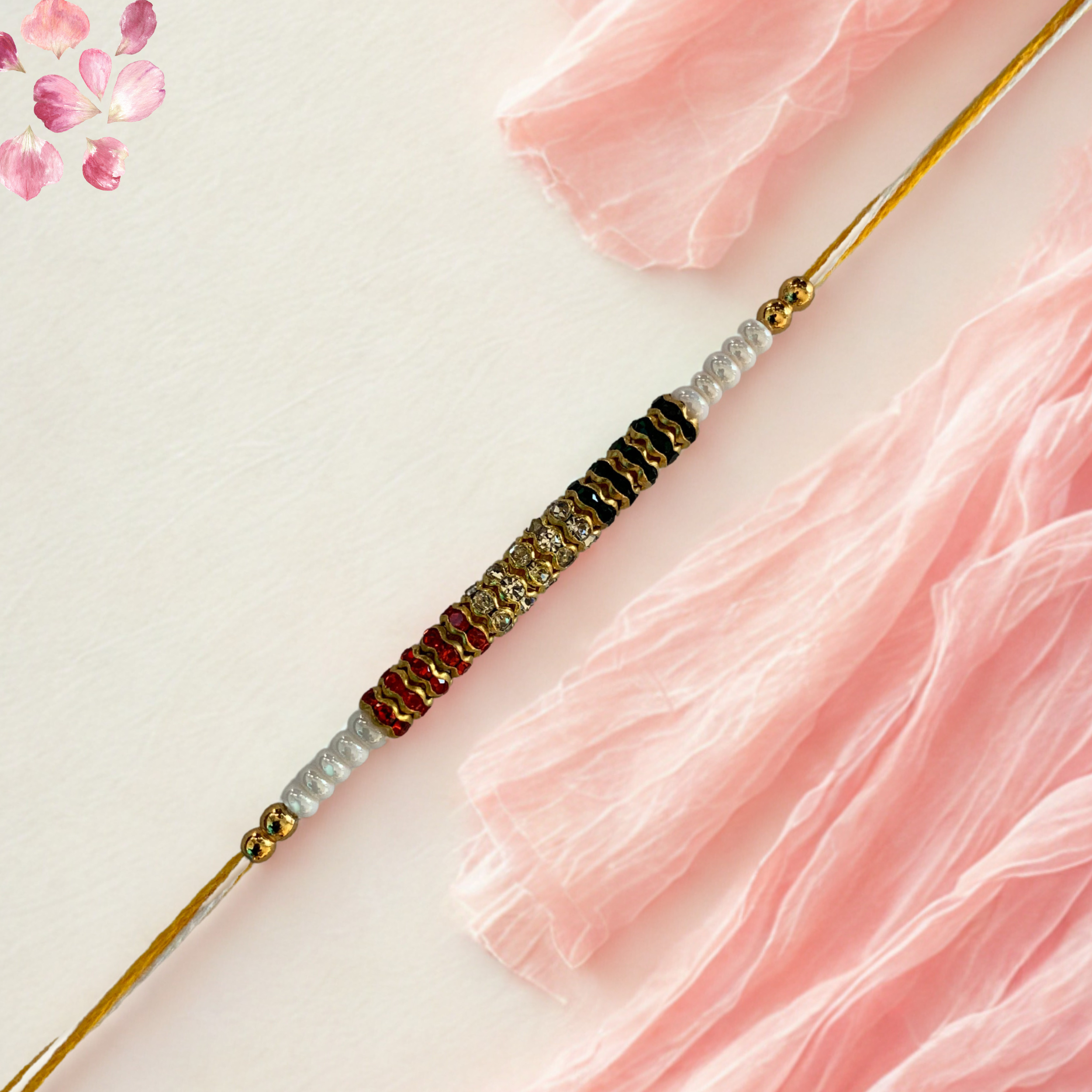 Multicolor Threaded Rakhi with Golden Rings and Yellow Thread