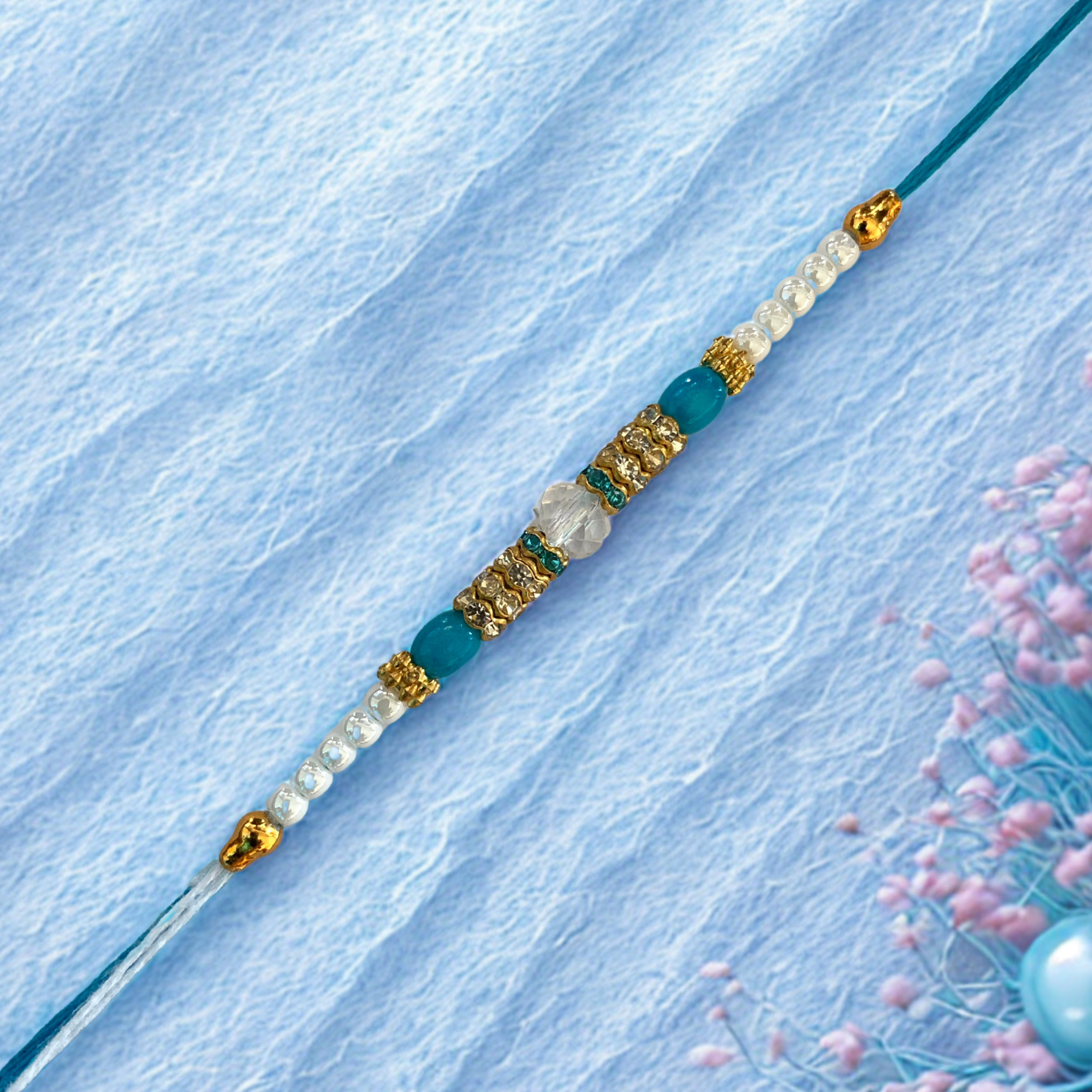Royal Light Blue Crystal Rakhi with Golden Accents