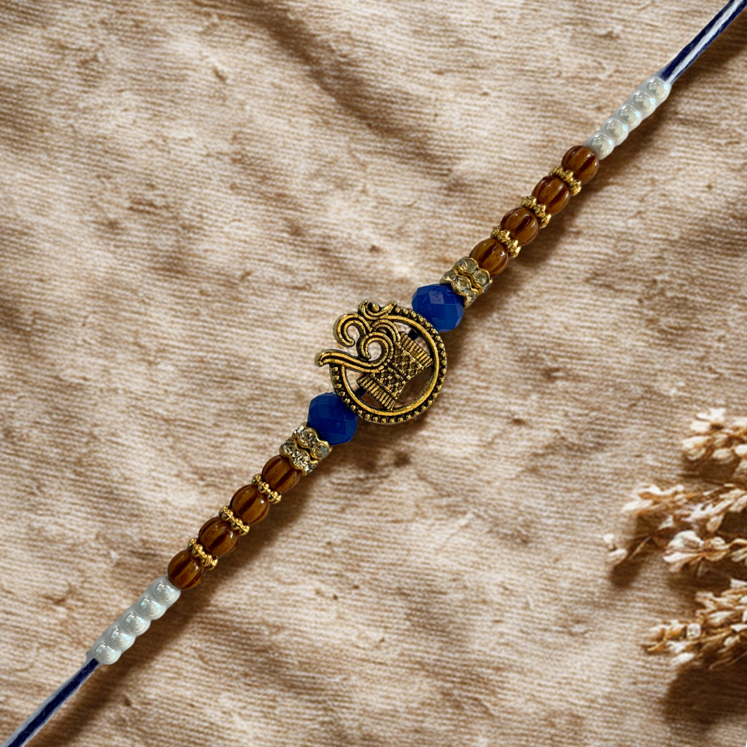 Spiritual Om Rakhi with Wooden & Blue Beads