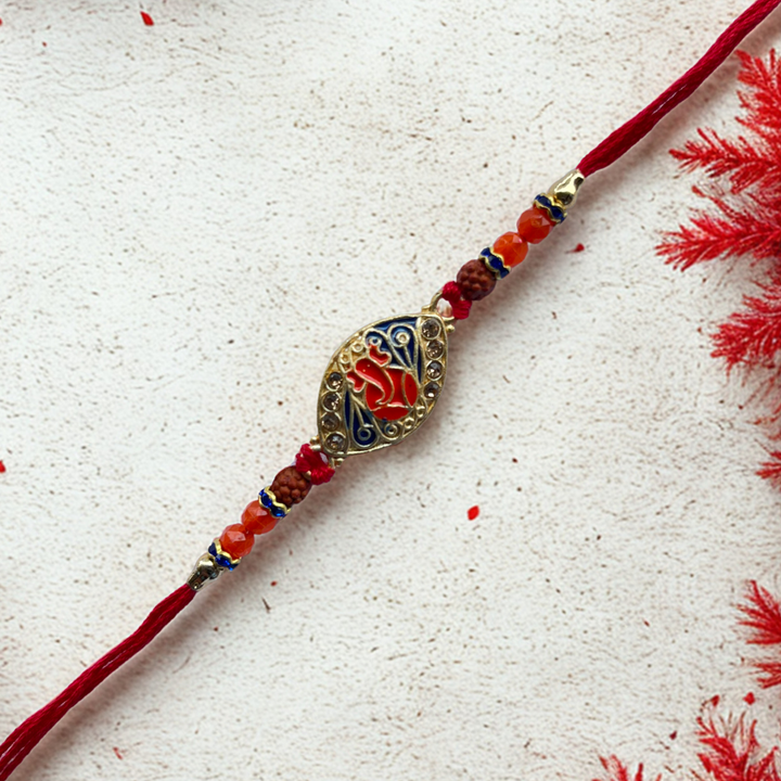 Ganesh Rudraksha Rakhi with Enamel Gold Finish