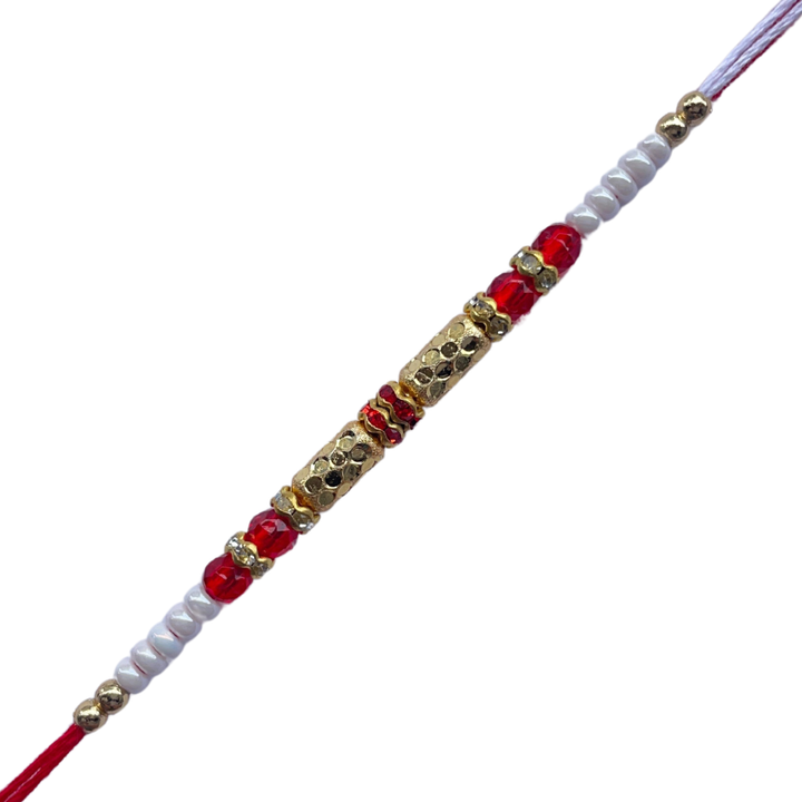 Classic Gold Barrel Bead Rakhi with Red & White Accents