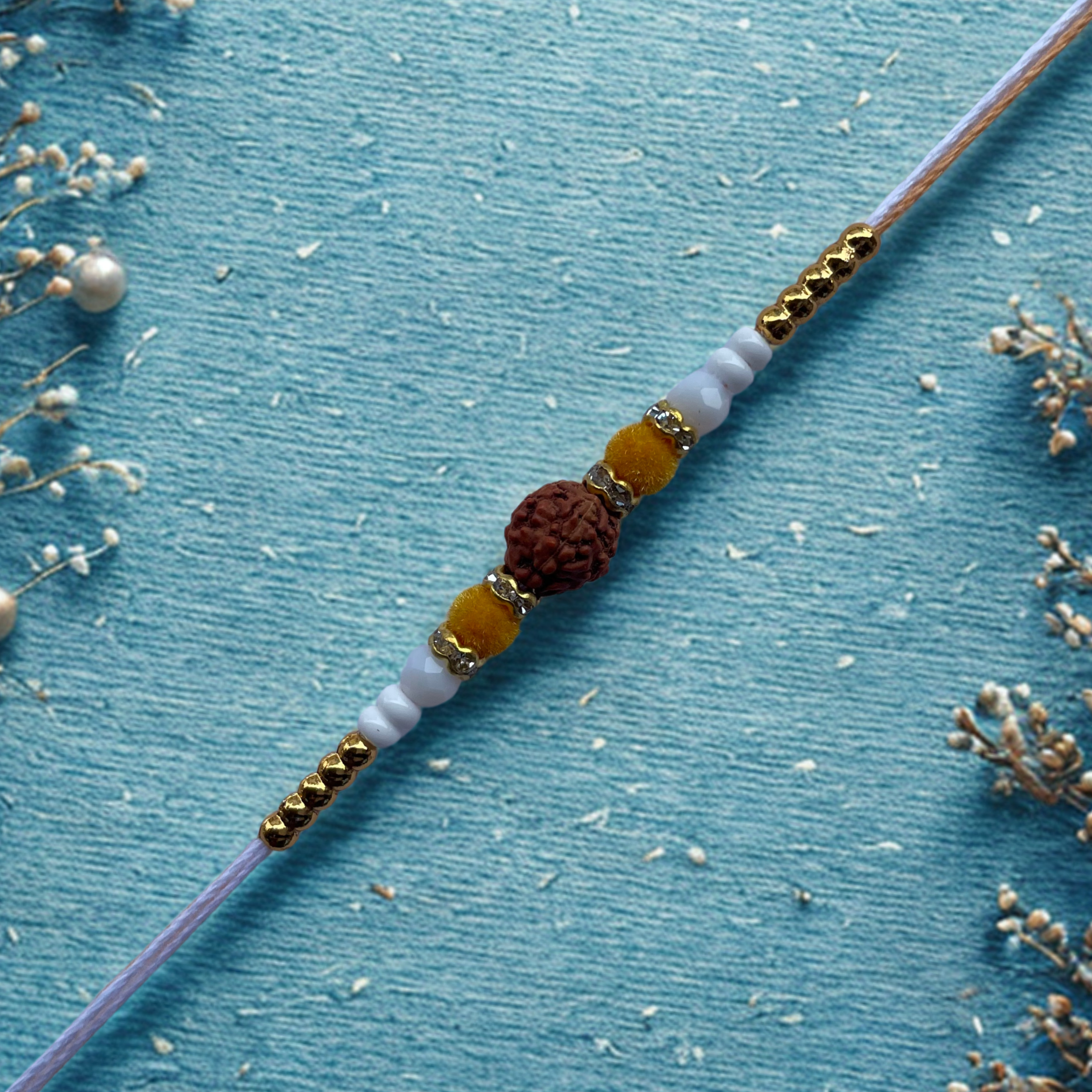 Traditional Rudraksha Rakhi with Light Orange Thread