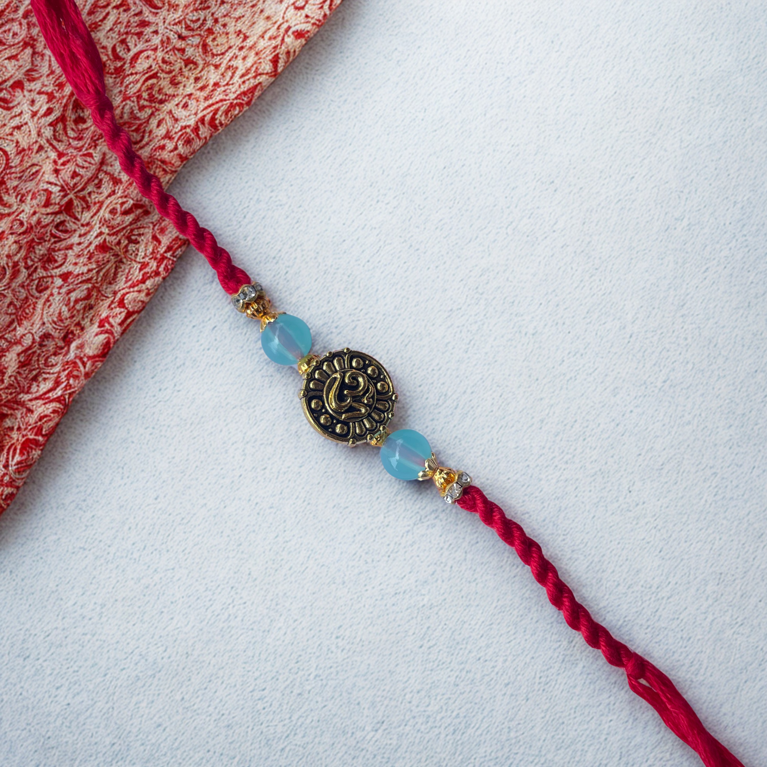 Omkara Bandhan Rakhi - Traditional Rakhi with Om Symbol & Divine Charm