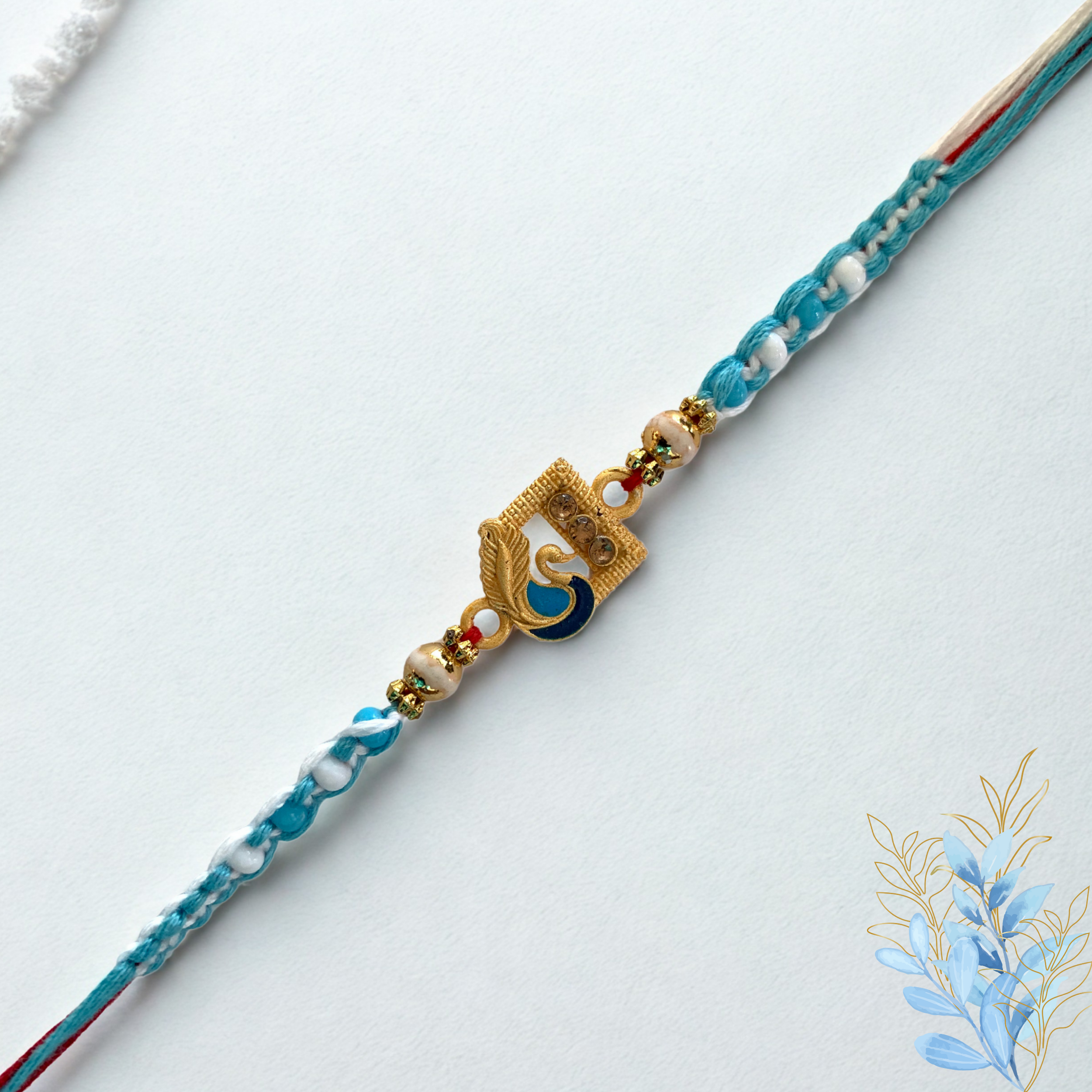 Blue Peacock Design Rakhi with Pearls & Golden Charm