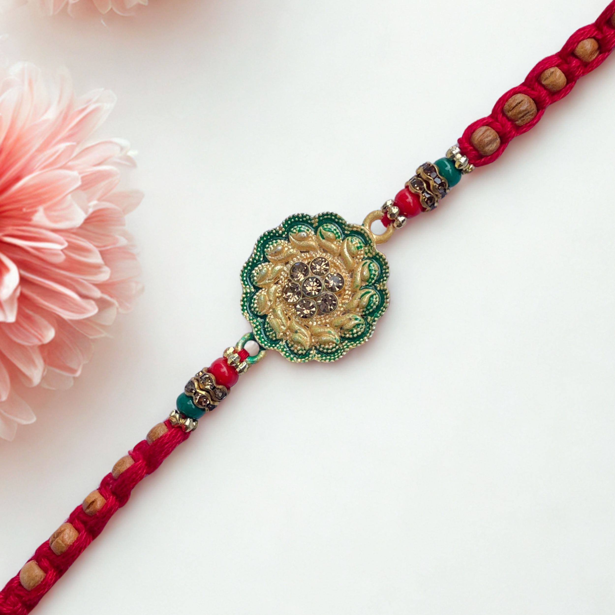 Traditional Floral Rakhi with Green Beaded Design