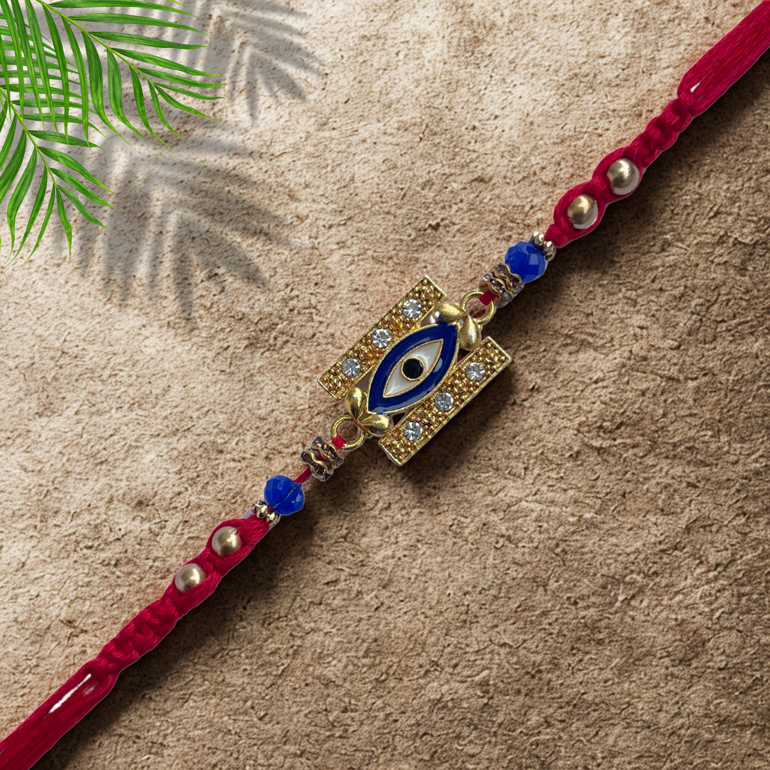 Evil Eye Rakhi with Blue Beads & Crystals