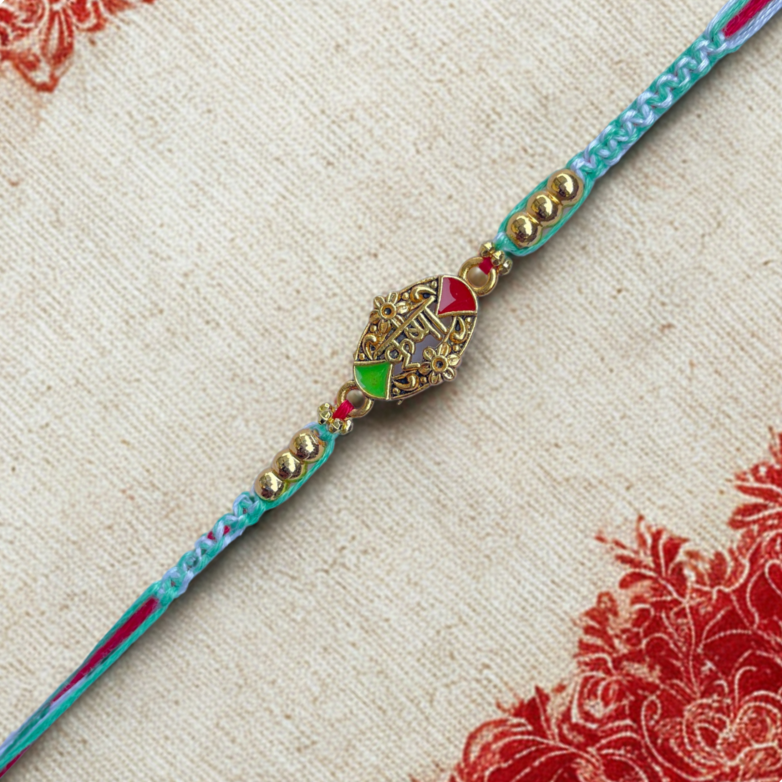Golden Krishna Rakhi with Beads & Multicolor Thread