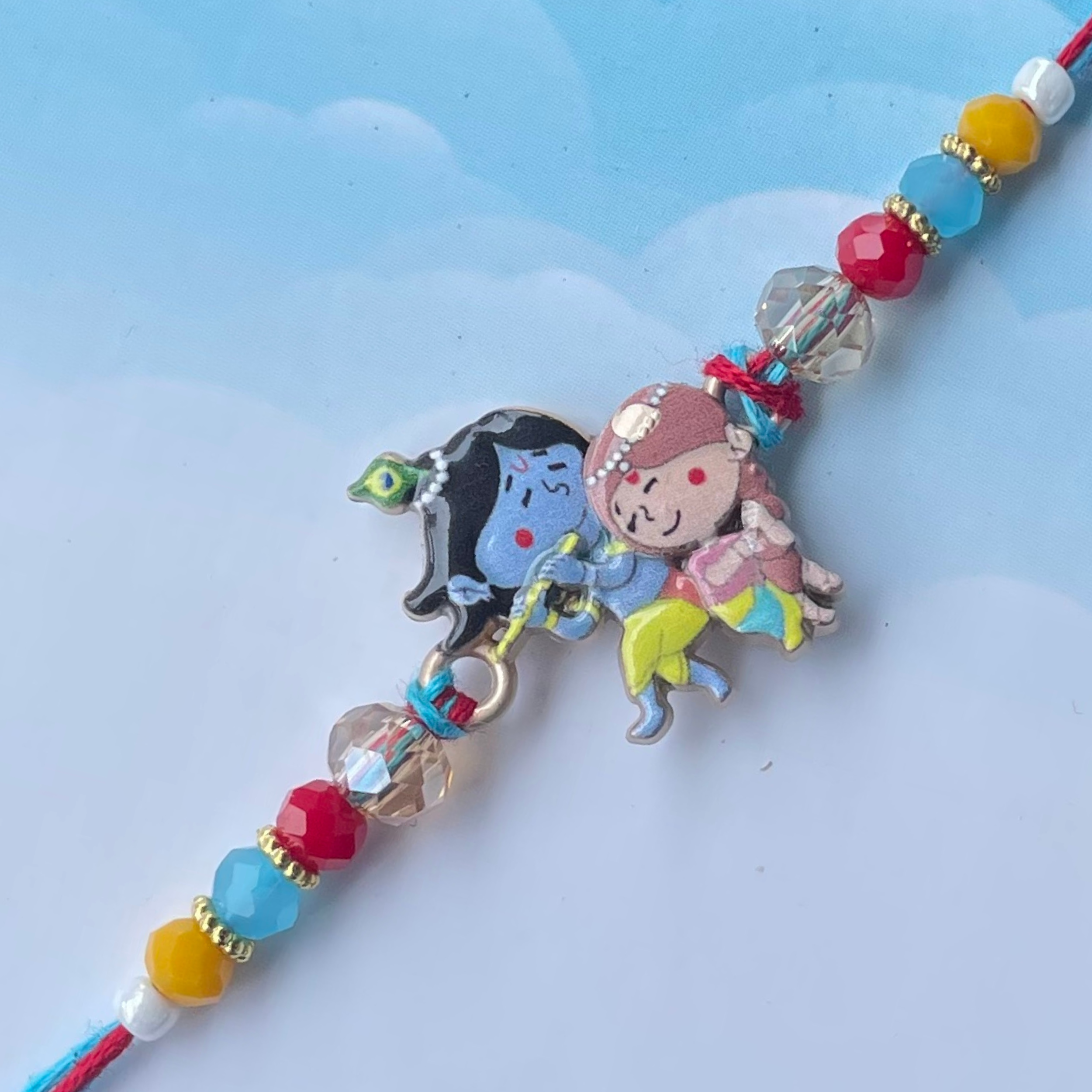 Mythical Mischief Duo Kids Rakhi with Krishna & Radha Cartoon Design