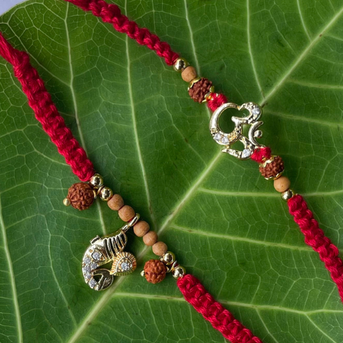 Bodhi Bonds: Om & Rudraksha Rakhi Set for Bhai Bhabhi