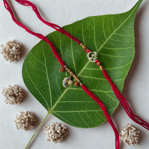 Bodhi Bonds: Om & Rudraksha Rakhi Set for Bhai Bhabhi