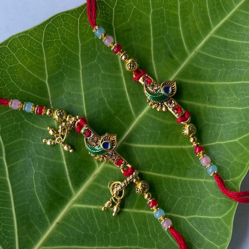 Morpankh Mela - Krishna-Inspired Peacock Feather Rakhi Set for Bhai Bhabhi
