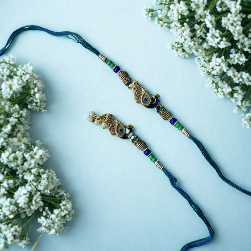Peacock Grace - Krishna-Inspired Peacock Rakhi for Bhai Bhabhi