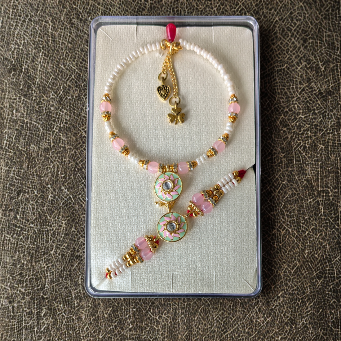 Lotus Bond: Elegant Handcrafted Rakhi with Spiritual Lotus Charm