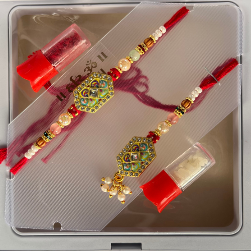 Golden Guardian Rakhi Pair with Regal Touch