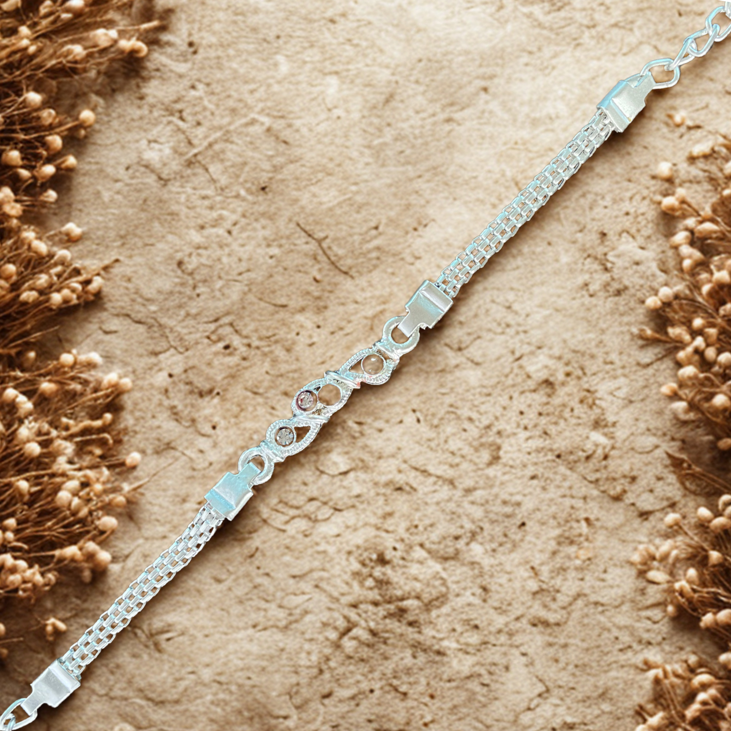 Elegant Silver Chain Rakhi with Stone Detailing