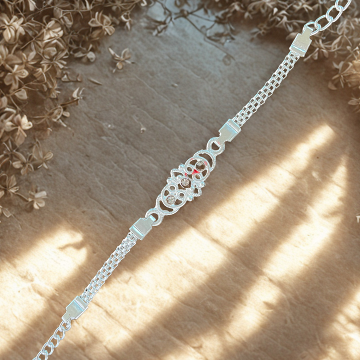 Elegant Silver Chain Rakhi with Abstract Design