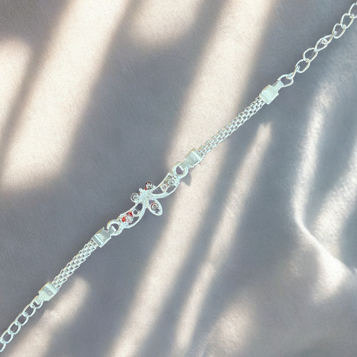 Stylish Silver Chain Rakhi with Floral Twist