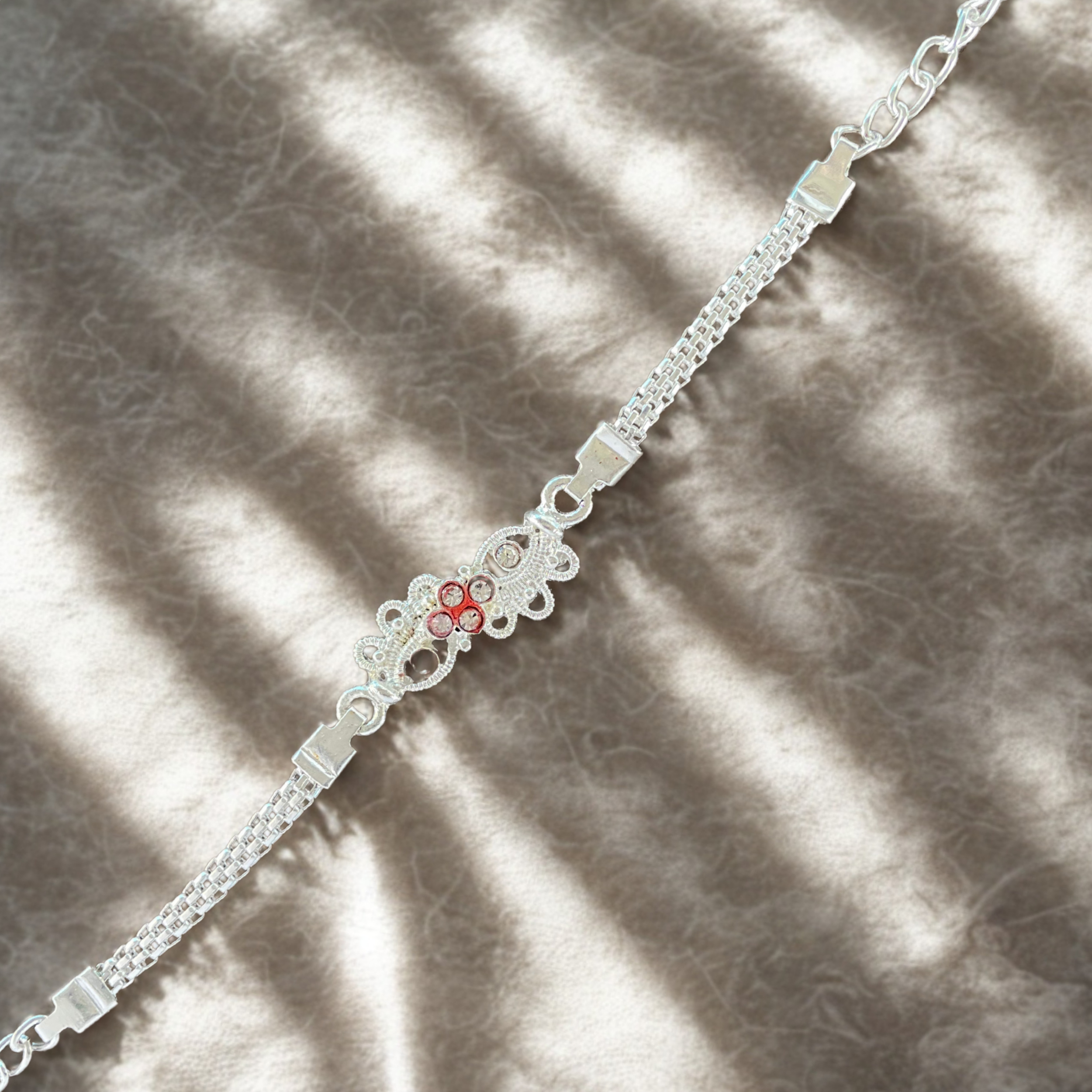 Silver Bloom Rakhi with Designer Floral Centerpiece