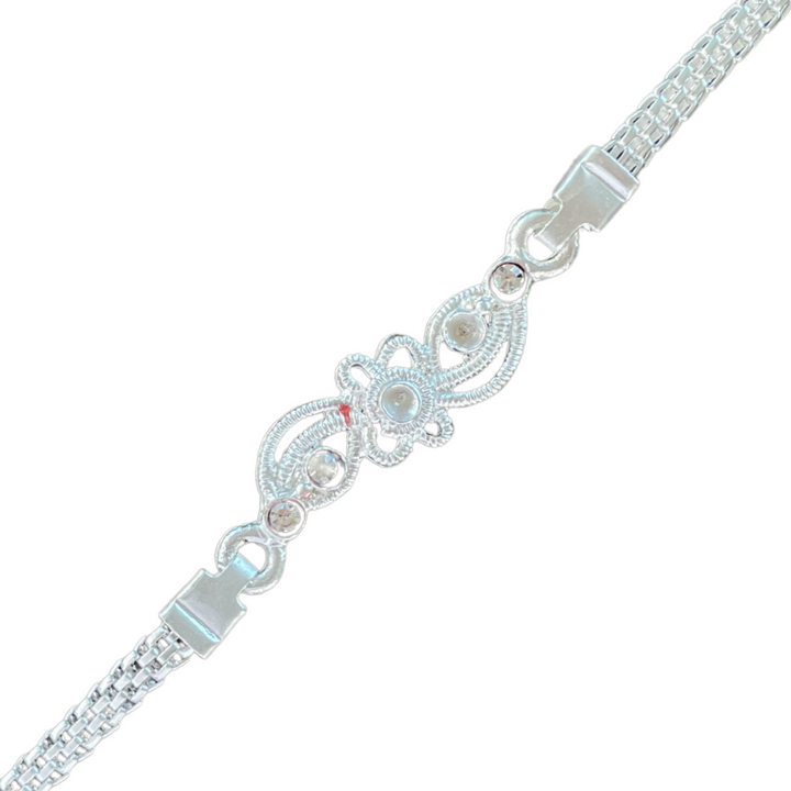 Elegant Silver-Toned Rakhi with Floral Filigree Center